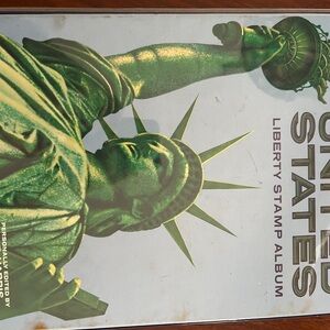 Statue of Liberty United States stamp album loaded with stamps copyright 1973